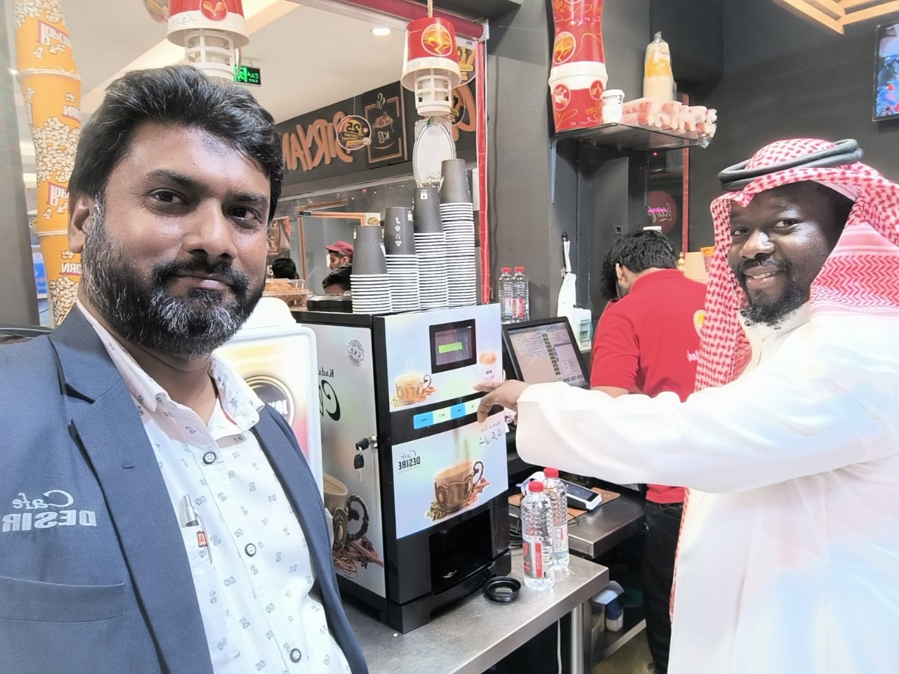 Café Desire machine serving karak at a food court outlet
