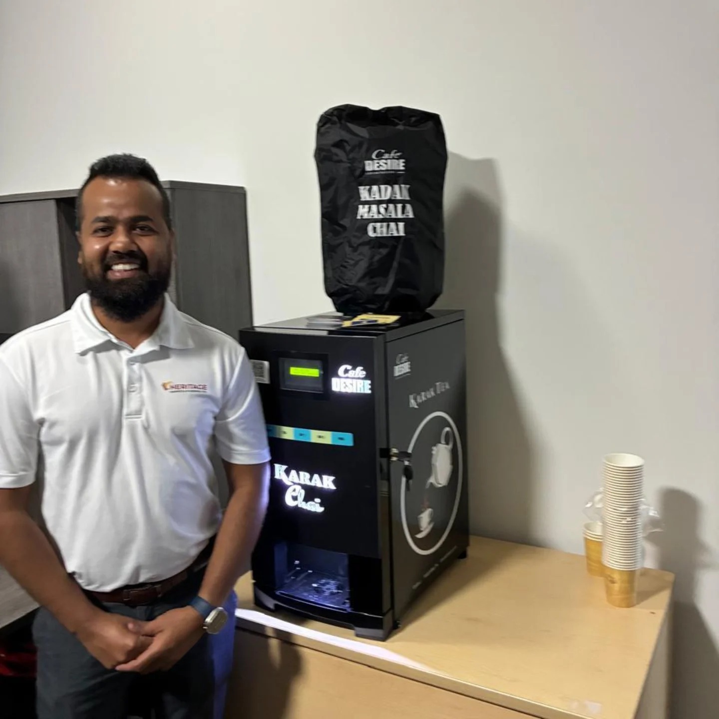 Office staff with Café Desire karak machine